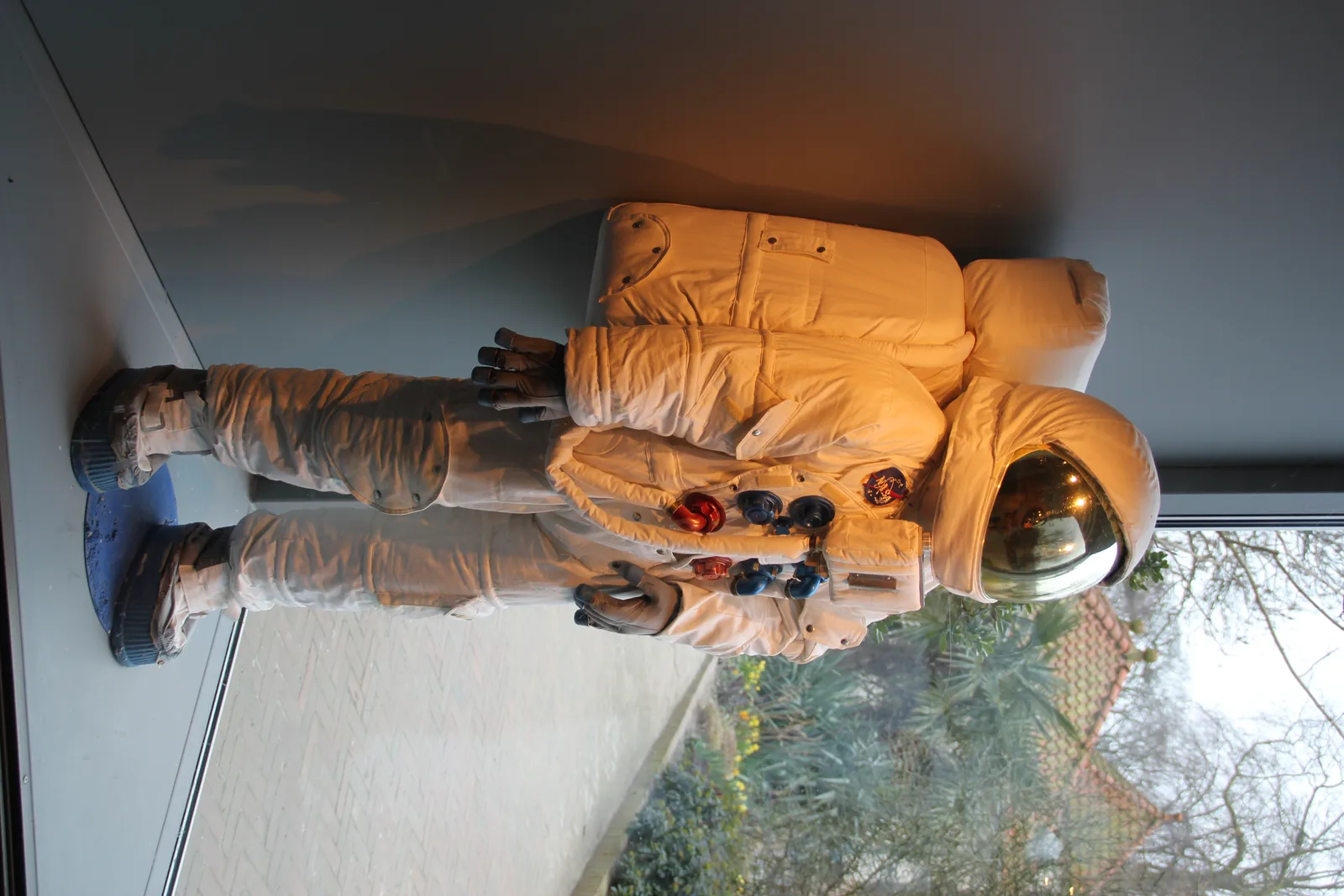 Astronaut suit display and space science exhibits at the ARTIS Planetarium in Amsterdam